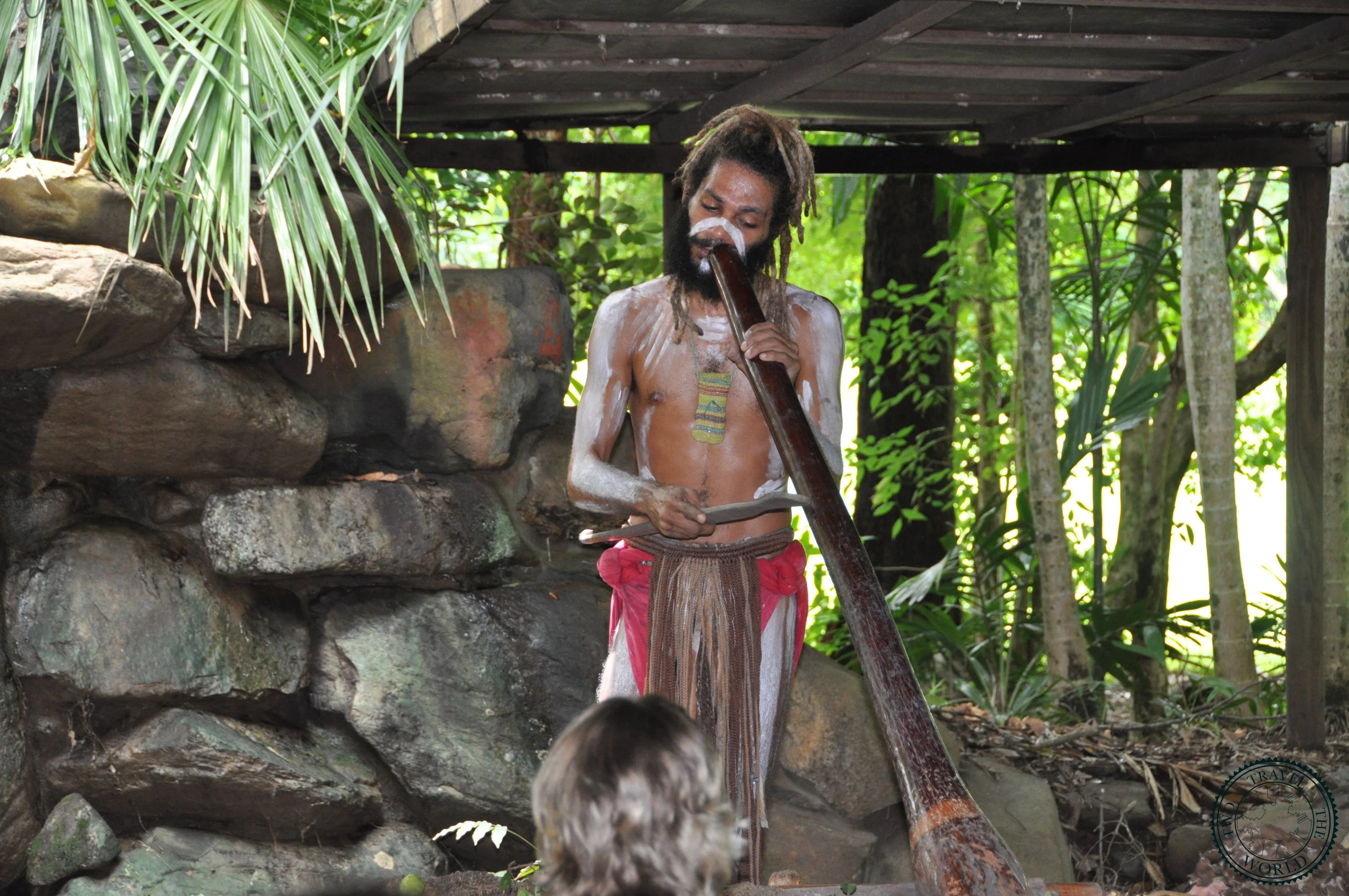 Night fire ceremony with traditional Tjapukai warriors performing by torchlight