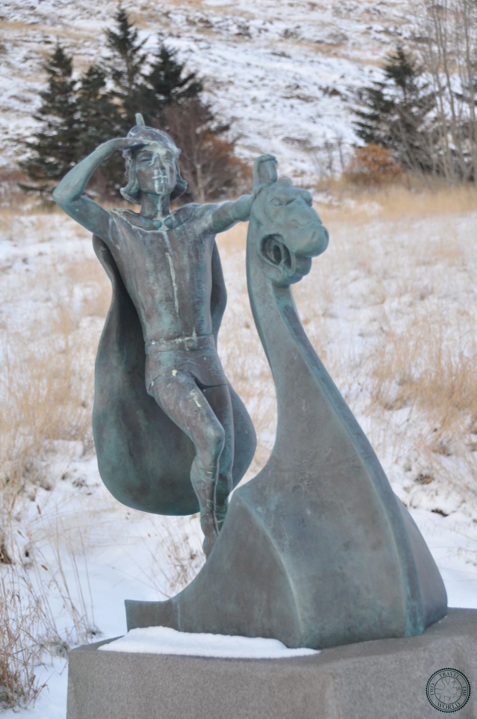 Bronze statue of Leif Eiríksson in a snowy winter landscape near the museum