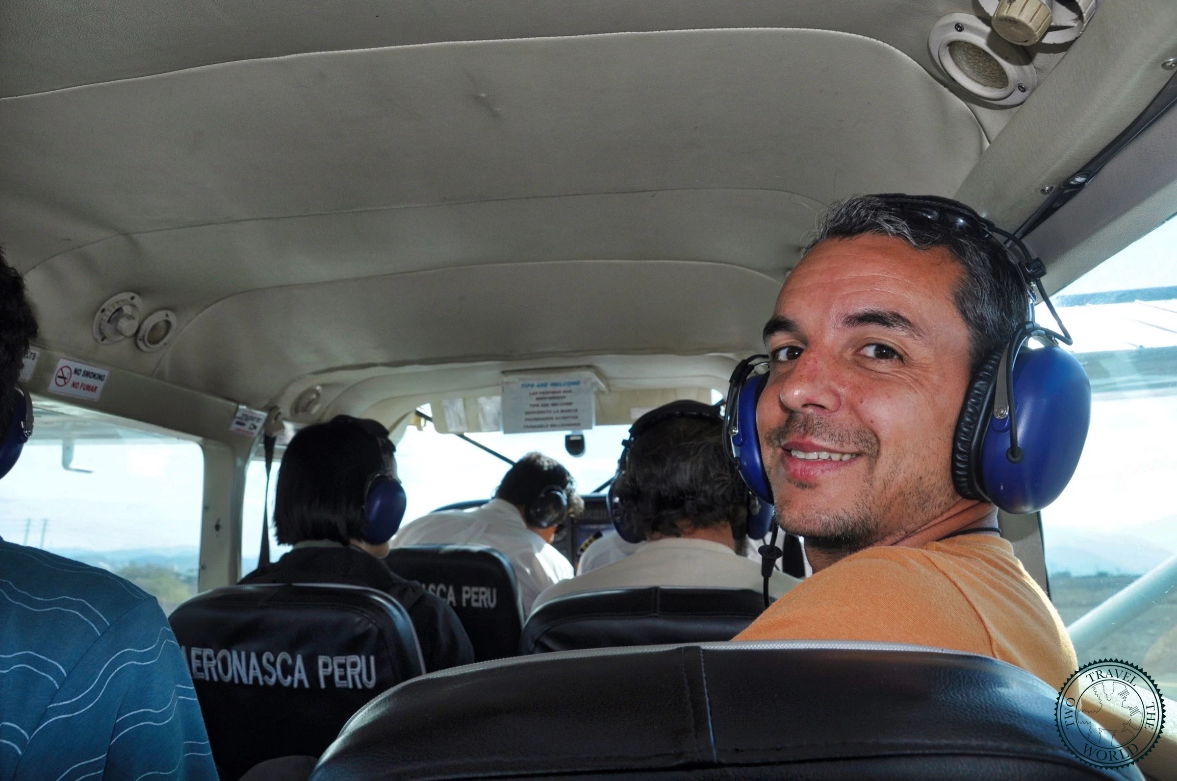Small Cessna aircraft on the runway at Nazca Airport, preparing for the Nazca Lines scenic flight