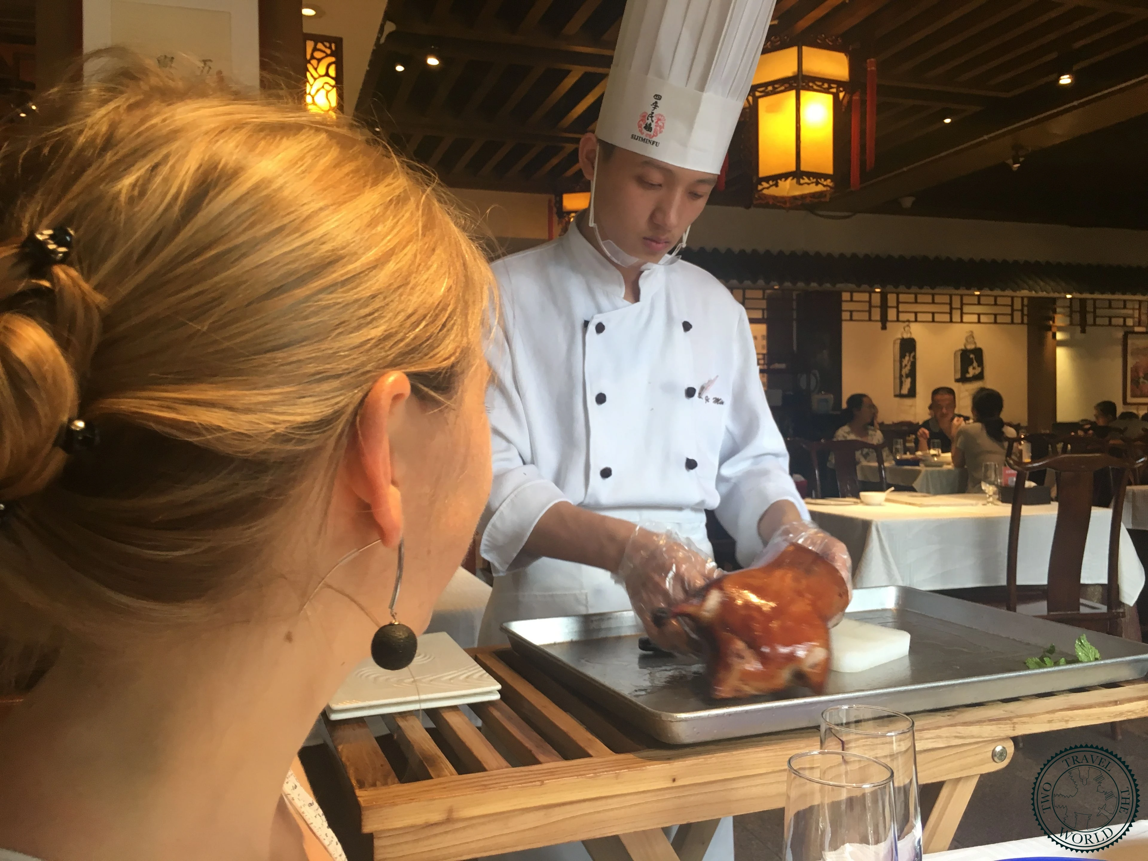 Traditional Peking duck served with accompaniments