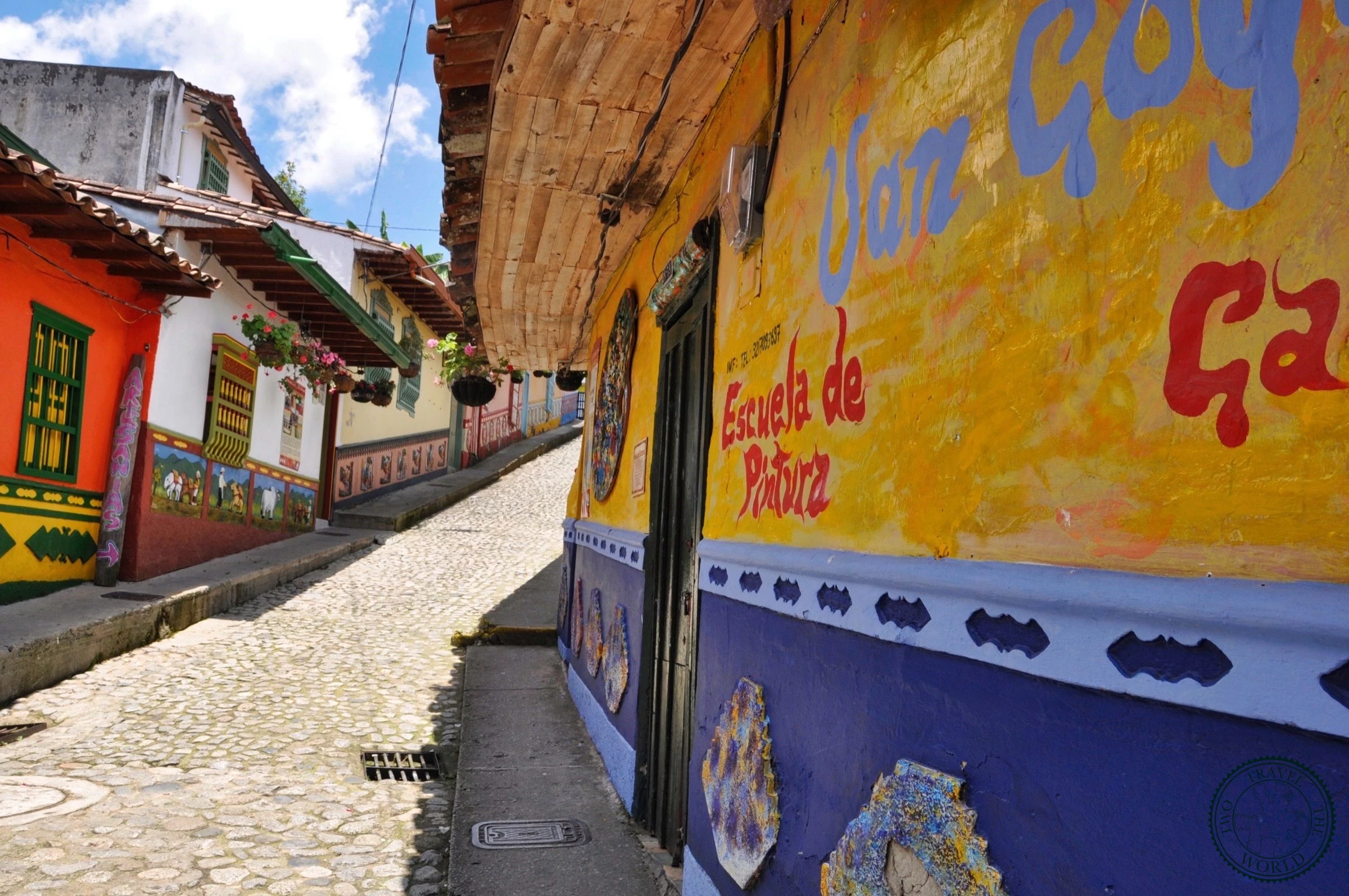 Colorful buildings in Guatapé with traditional Zócalo painted bas-reliefs