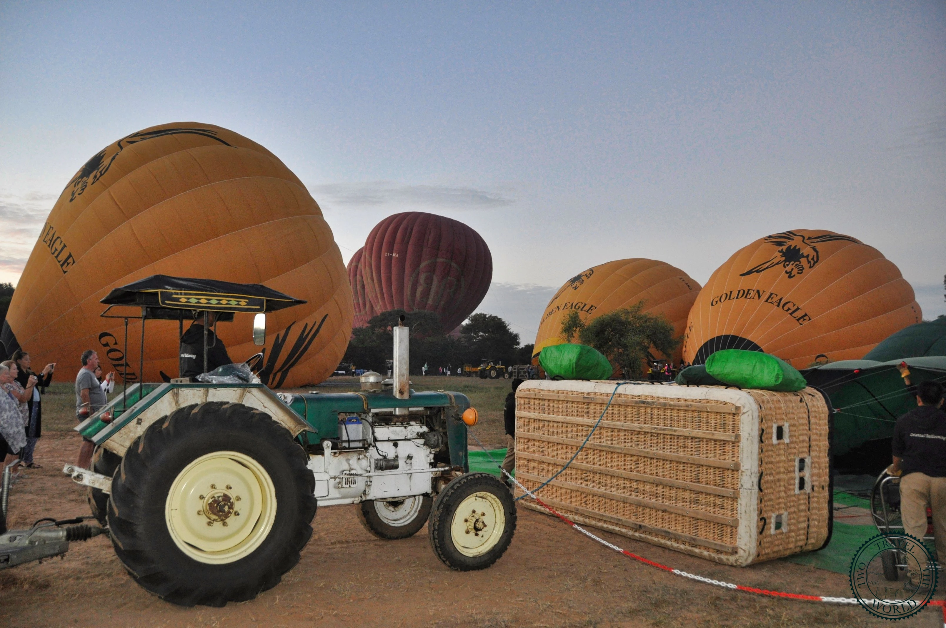 Preparing hot air balloons at dawn in Bagan