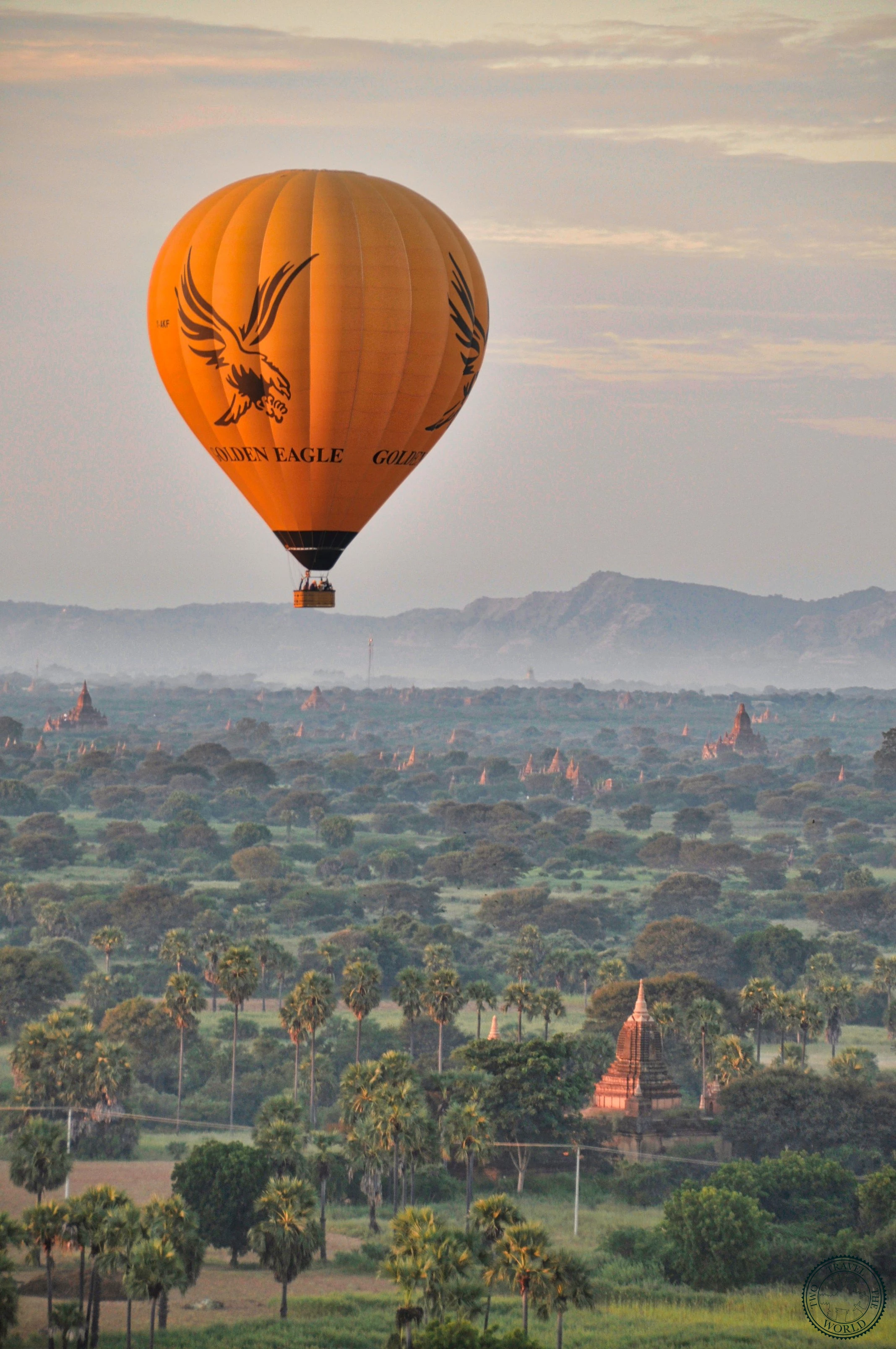 Hot air balloon basket with passengers ready for takeoff