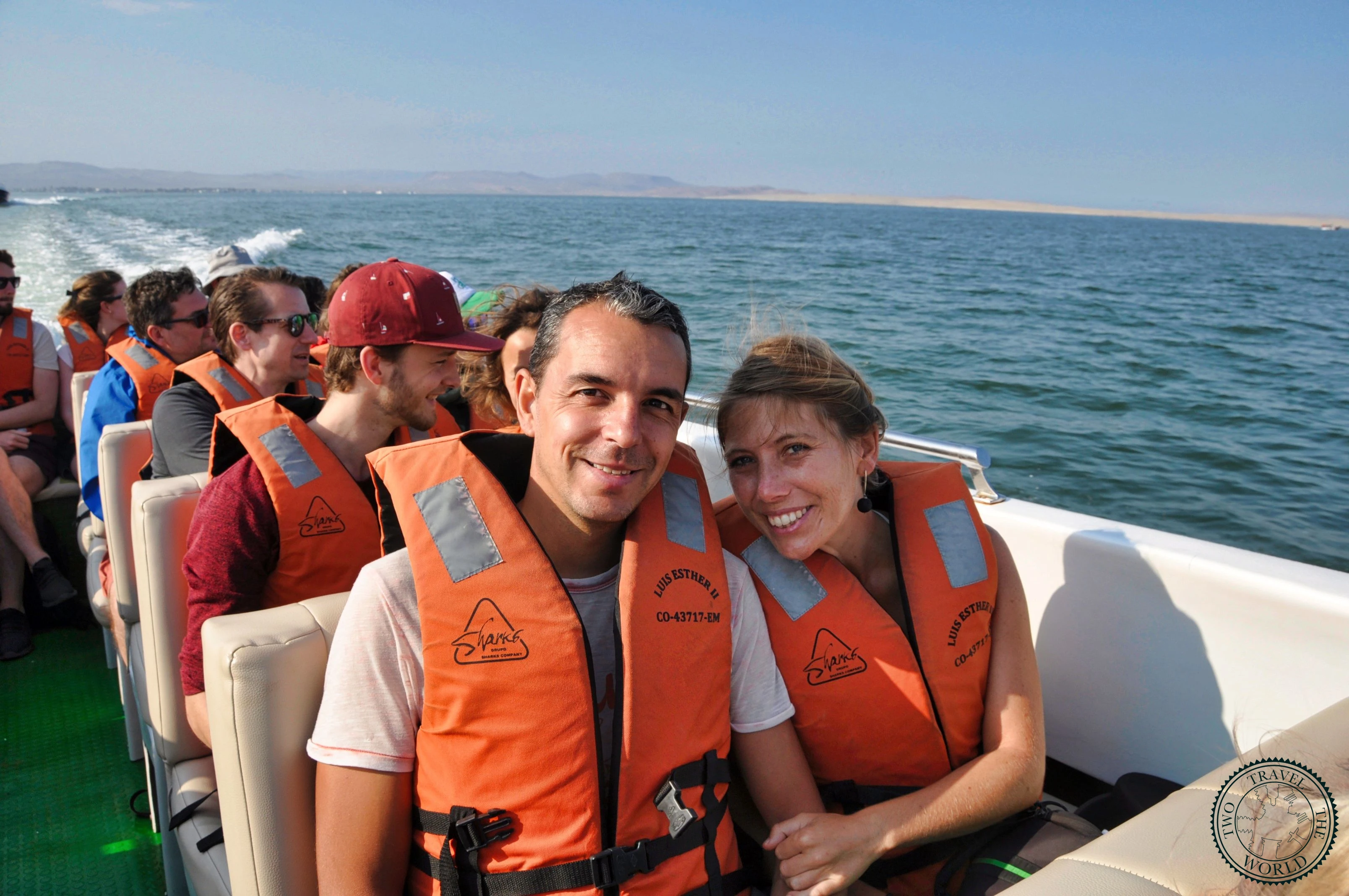 Speedboat departing from Paracas harbor for the Ballestas Islands wildlife tour with passengers aboard