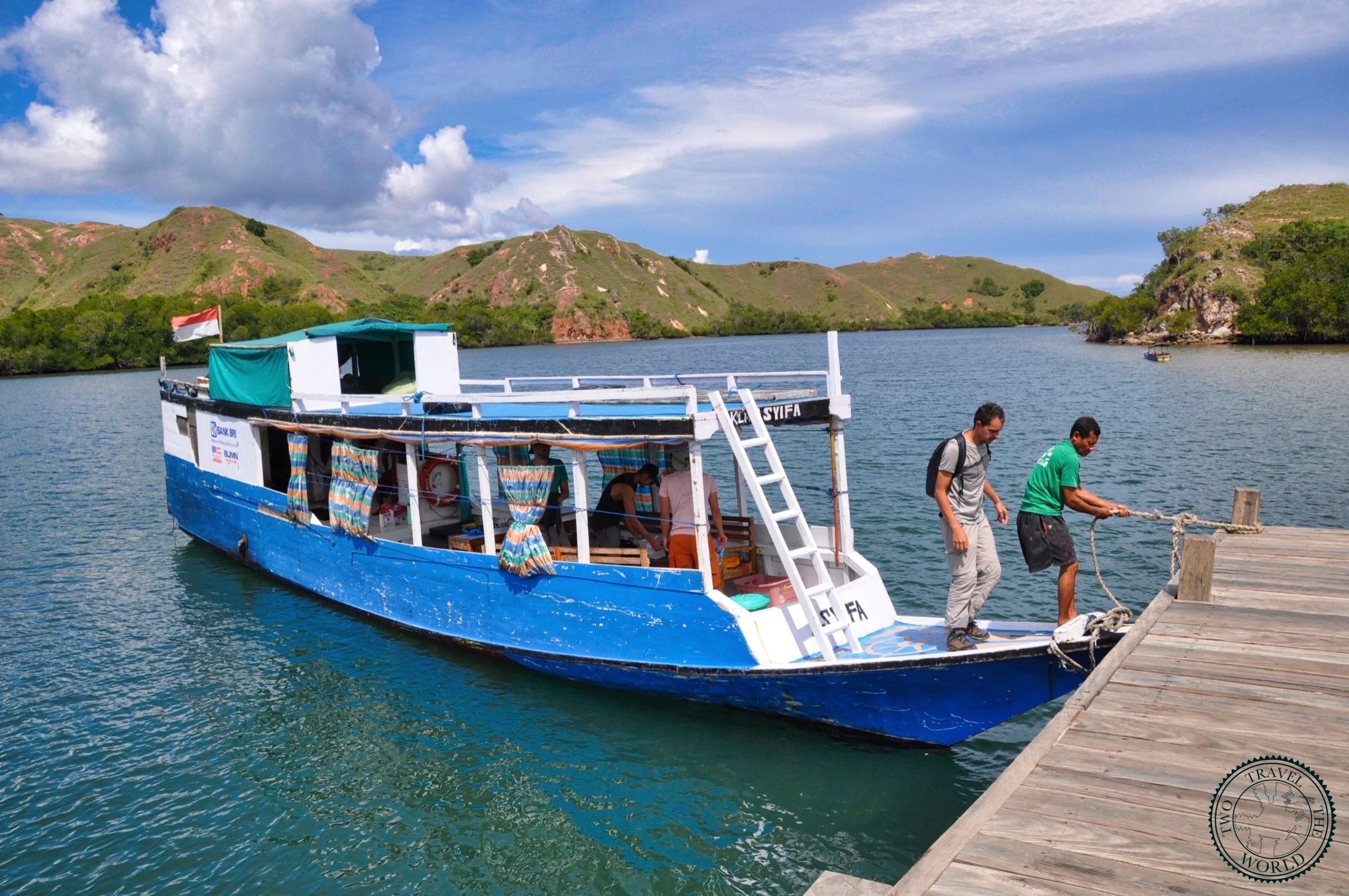 Life on deck of a budget Komodo boat with Indonesian crew preparing for the journey