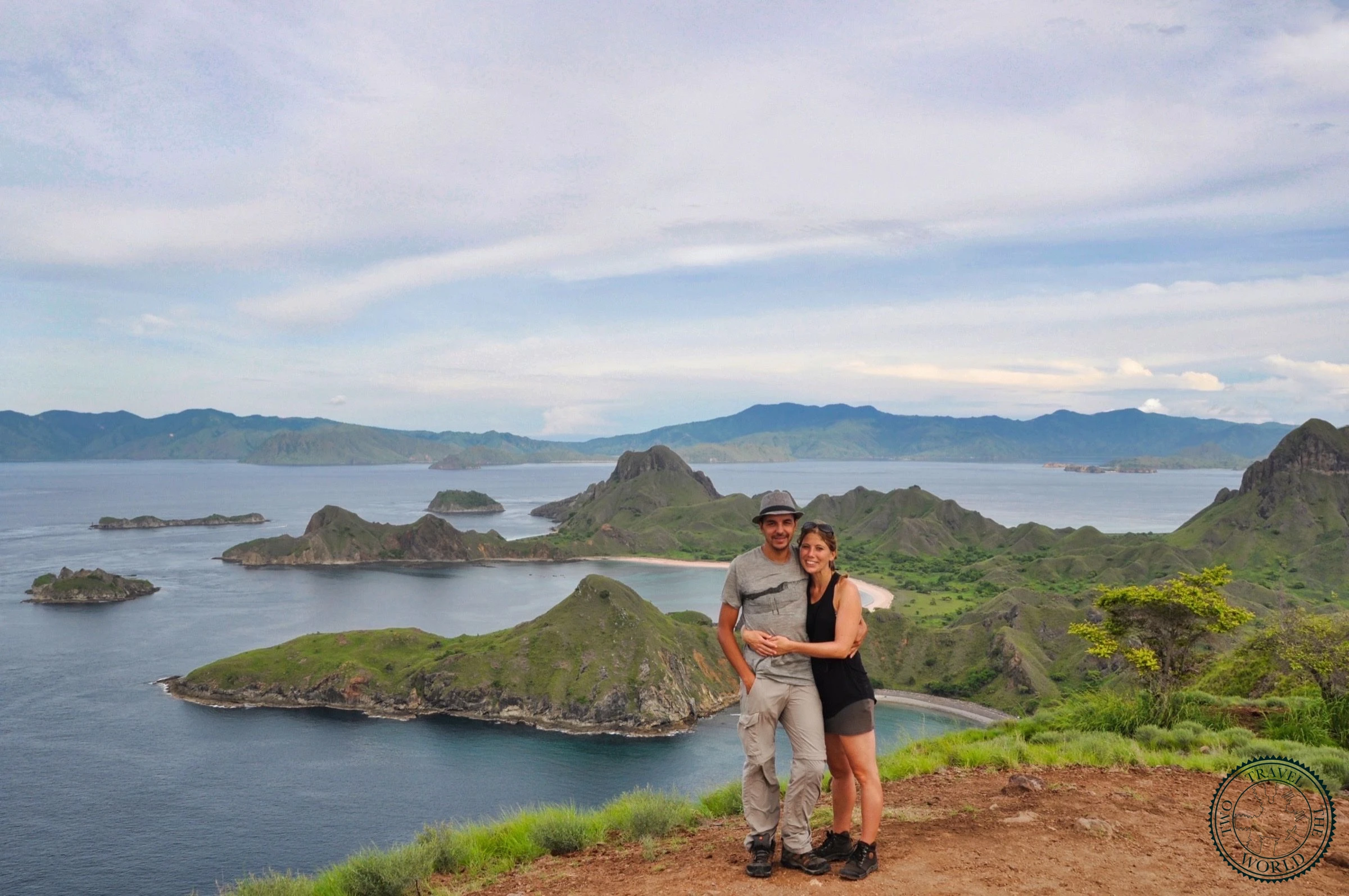 Dramatic volcanic landscape of Padar Island with multiple colored beaches and pristine bays